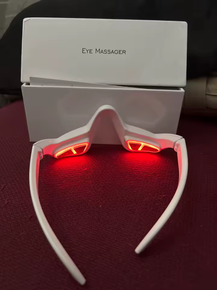 Eye Massager displayed in front of the box