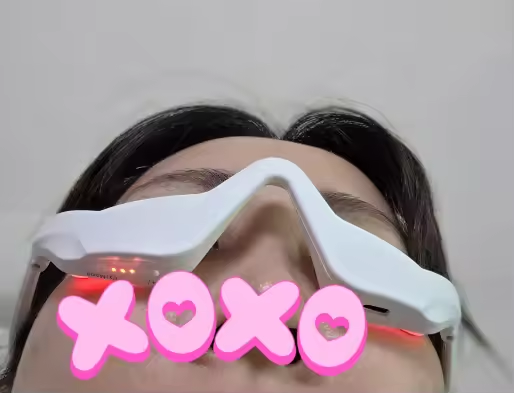 Close-up selfie wearing the Eye Massager